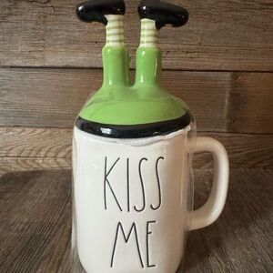 Rae Dunn 'Kiss Me' Mug with leprechaun legs lid